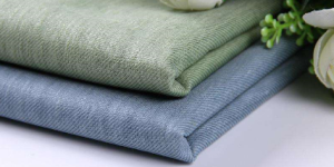 What are the advantages and disadvantages of cotton and linen fabrics?