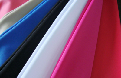 What kind of fabric is spandex and what are its advantages and disadvantages?